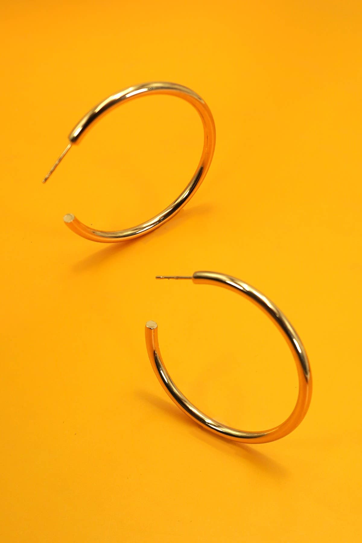 NEW OBSESSION WATERPROOF HOOPS GOLD